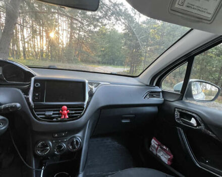 Білий Пежо 208, об'ємом двигуна 1.2 л та пробігом 119 тис. км за 6500 $, фото 10 на Automoto.ua