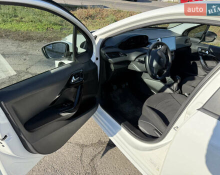 Белый Пежо 208, объемом двигателя 1 л и пробегом 109 тыс. км за 5400 $, фото 12 на Automoto.ua