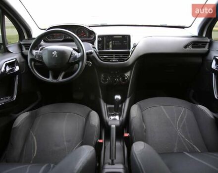 Белый Пежо 208, объемом двигателя 1.2 л и пробегом 93 тыс. км за 7800 $, фото 13 на Automoto.ua
