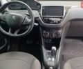 Білий Пежо 208, об'ємом двигуна 1.2 л та пробігом 92 тис. км за 7500 $, фото 4 на Automoto.ua