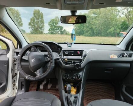 Білий Пежо 208, об'ємом двигуна 1 л та пробігом 82 тис. км за 5000 $, фото 9 на Automoto.ua