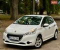 Белый Пежо 208, объемом двигателя 1 л и пробегом 209 тыс. км за 4734 $, фото 1 на Automoto.ua