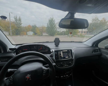 Білий Пежо 208, об'ємом двигуна 1.6 л та пробігом 77 тис. км за 8800 $, фото 9 на Automoto.ua