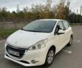 Белый Пежо 208, объемом двигателя 1.2 л и пробегом 204 тыс. км за 4200 $, фото 1 на Automoto.ua