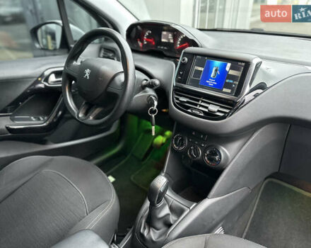 Белый Пежо 208, объемом двигателя 1 л и пробегом 102 тыс. км за 5500 $, фото 18 на Automoto.ua