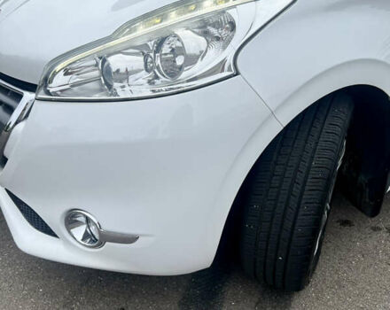Білий Пежо 208, об'ємом двигуна 1.6 л та пробігом 77 тис. км за 8800 $, фото 3 на Automoto.ua