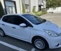 Белый Пежо 208, объемом двигателя 1 л и пробегом 56 тыс. км за 6400 $, фото 1 на Automoto.ua