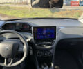 Белый Пежо 208, объемом двигателя 1 л и пробегом 109 тыс. км за 5400 $, фото 9 на Automoto.ua