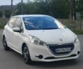Білий Пежо 208, об'ємом двигуна 1 л та пробігом 145 тис. км за 6378 $, фото 1 на Automoto.ua