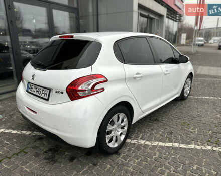 Белый Пежо 208, объемом двигателя 1 л и пробегом 102 тыс. км за 5500 $, фото 11 на Automoto.ua