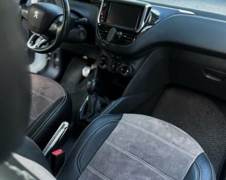 Белый Пежо 208, объемом двигателя 1.56 л и пробегом 175 тыс. км за 7900 $, фото 27 на Automoto.ua