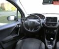 Белый Пежо 208, объемом двигателя 1.2 л и пробегом 93 тыс. км за 7800 $, фото 11 на Automoto.ua