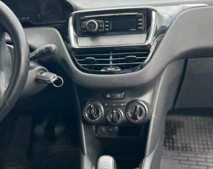 Белый Пежо 208, объемом двигателя 1.4 л и пробегом 186 тыс. км за 6400 $, фото 5 на Automoto.ua