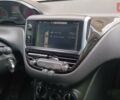 Білий Пежо 208, об'ємом двигуна 1.2 л та пробігом 92 тис. км за 7500 $, фото 10 на Automoto.ua