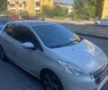 Белый Пежо 208, объемом двигателя 1.57 л и пробегом 205 тыс. км за 8000 $, фото 1 на Automoto.ua