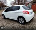 Білий Пежо 208, об'ємом двигуна 1.2 л та пробігом 74 тис. км за 7500 $, фото 3 на Automoto.ua