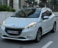 Белый Пежо 208, объемом двигателя 1.6 л и пробегом 205 тыс. км за 5950 $, фото 1 на Automoto.ua