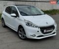 Білий Пежо 208, об'ємом двигуна 1.2 л та пробігом 224 тис. км за 6999 $, фото 1 на Automoto.ua