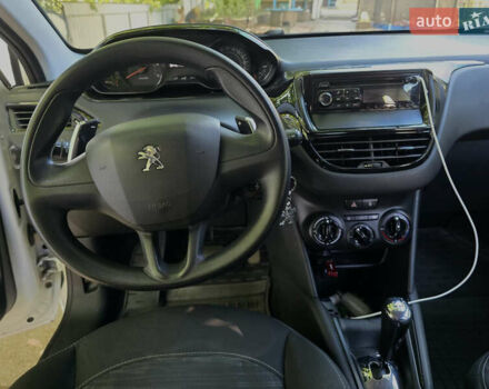 Білий Пежо 208, об'ємом двигуна 1.4 л та пробігом 164 тис. км за 7800 $, фото 3 на Automoto.ua