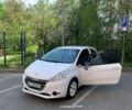 Белый Пежо 208, объемом двигателя 1 л и пробегом 162 тыс. км за 4599 $, фото 1 на Automoto.ua