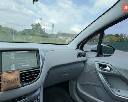 Пежо 208 2014 в Ивано-Франковске на Automoto.ua Белый Пежо 208, объемом двигателя 1.2 л и пробегом 93 тыс. км за 7500 $, фото 8 на Automoto.ua