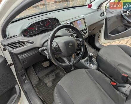 Білий Пежо 208, об'ємом двигуна 1.4 л та пробігом 181 тис. км за 7850 $, фото 6 на Automoto.ua