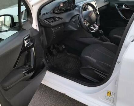 Белый Пежо 208, объемом двигателя 1.4 л и пробегом 199 тыс. км за 7600 $, фото 13 на Automoto.ua