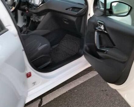 Белый Пежо 208, объемом двигателя 1.4 л и пробегом 199 тыс. км за 7600 $, фото 22 на Automoto.ua