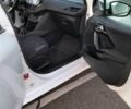Белый Пежо 208, объемом двигателя 1.4 л и пробегом 199 тыс. км за 7600 $, фото 22 на Automoto.ua