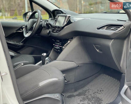 Білий Пежо 208, об'ємом двигуна 1.2 л та пробігом 142 тис. км за 8999 $, фото 1 на Automoto.ua