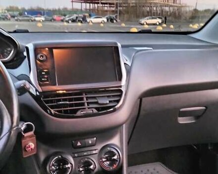 Белый Пежо 208, объемом двигателя 1.4 л и пробегом 199 тыс. км за 7600 $, фото 25 на Automoto.ua