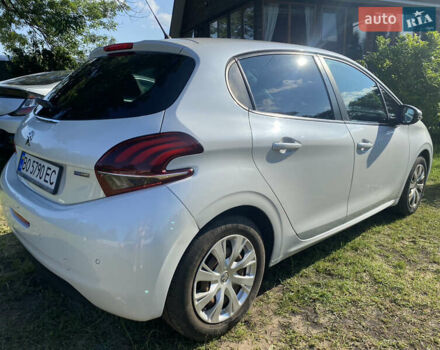 Белый Пежо 208, объемом двигателя 1.2 л и пробегом 74 тыс. км за 8000 $, фото 18 на Automoto.ua