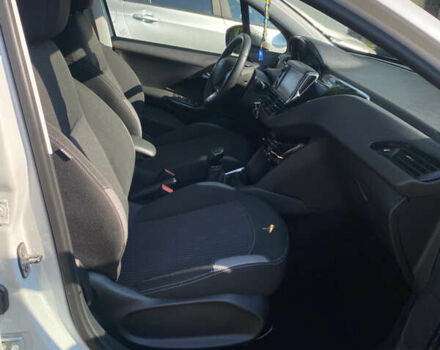 Белый Пежо 208, объемом двигателя 1.2 л и пробегом 74 тыс. км за 8000 $, фото 31 на Automoto.ua