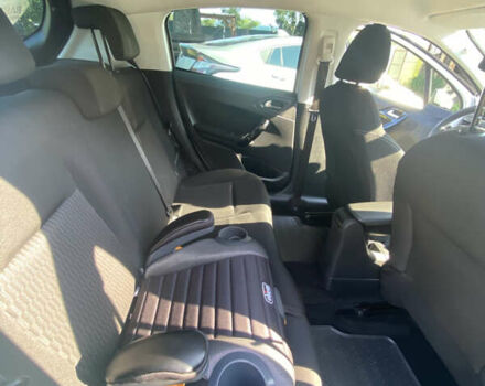 Белый Пежо 208, объемом двигателя 1.2 л и пробегом 74 тыс. км за 8000 $, фото 24 на Automoto.ua