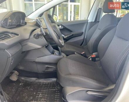 Белый Пежо 208, объемом двигателя 1.2 л и пробегом 76 тыс. км за 8200 $, фото 12 на Automoto.ua