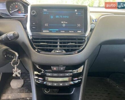 Белый Пежо 208, объемом двигателя 1.2 л и пробегом 76 тыс. км за 8200 $, фото 20 на Automoto.ua