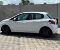 Білий Пежо 208, об'ємом двигуна 1.2 л та пробігом 126 тис. км за 9990 $, фото 2 на Automoto.ua