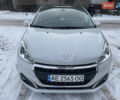 Белый Пежо 208, объемом двигателя 1.2 л и пробегом 62 тыс. км за 9100 $, фото 1 на Automoto.ua