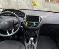 Белый Пежо 208, объемом двигателя 1.5 л и пробегом 190 тыс. км за 7900 $, фото 1 на Automoto.ua