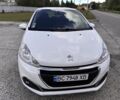 Белый Пежо 208, объемом двигателя 1.6 л и пробегом 170 тыс. км за 9799 $, фото 1 на Automoto.ua