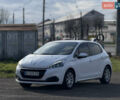 Белый Пежо 208, объемом двигателя 1.2 л и пробегом 127 тыс. км за 6750 $, фото 1 на Automoto.ua