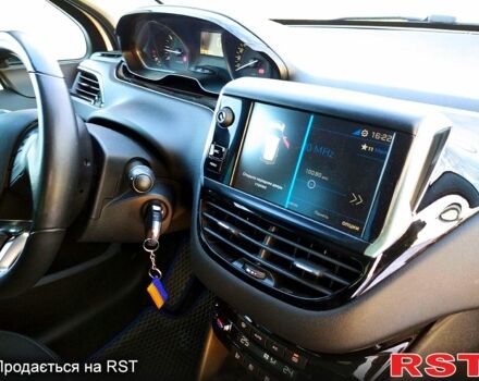 Белый Пежо 208, объемом двигателя 1.2 л и пробегом 78 тыс. км за 8500 $, фото 3 на Automoto.ua