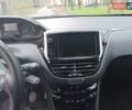 Белый Пежо 208, объемом двигателя 1.5 л и пробегом 84 тыс. км за 9400 $, фото 11 на Automoto.ua