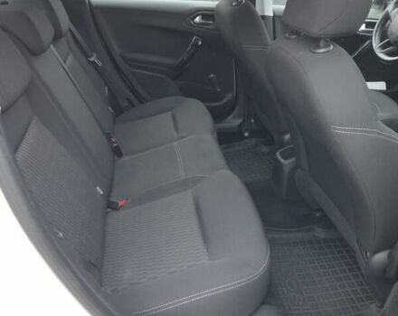 Белый Пежо 208, объемом двигателя 1.2 л и пробегом 115 тыс. км за 6999 $, фото 7 на Automoto.ua