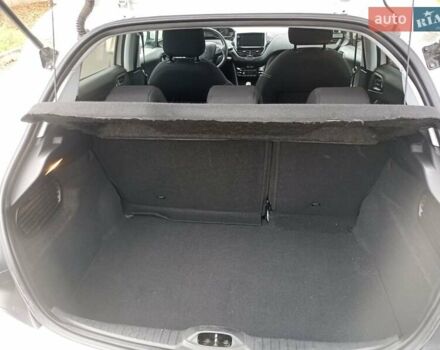 Белый Пежо 208, объемом двигателя 1.5 л и пробегом 84 тыс. км за 9400 $, фото 7 на Automoto.ua