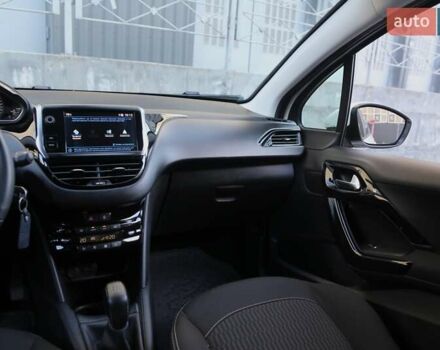 Белый Пежо 208, объемом двигателя 1.5 л и пробегом 55 тыс. км за 12000 $, фото 13 на Automoto.ua