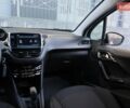 Белый Пежо 208, объемом двигателя 1.5 л и пробегом 55 тыс. км за 12000 $, фото 13 на Automoto.ua