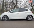 Белый Пежо 208, объемом двигателя 1.5 л и пробегом 84 тыс. км за 9400 $, фото 1 на Automoto.ua