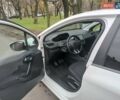 Белый Пежо 208, объемом двигателя 1.5 л и пробегом 84 тыс. км за 9400 $, фото 8 на Automoto.ua