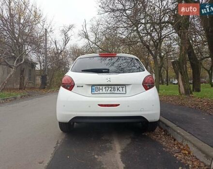 Белый Пежо 208, объемом двигателя 1.5 л и пробегом 84 тыс. км за 9400 $, фото 3 на Automoto.ua